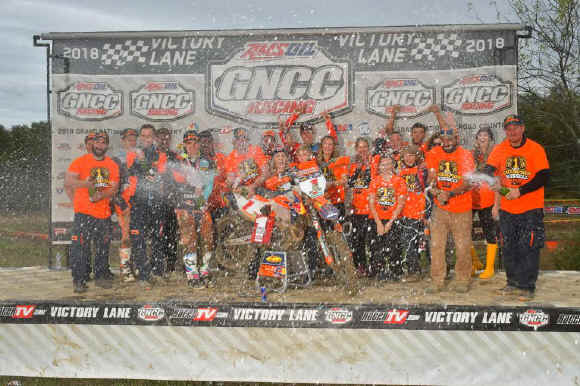 FMF/KTM Factory Racing celebrating Kailub Russell's Sixth-Consecutive GNCC National Championship with champagne showers.&nbsp;